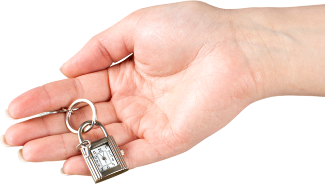 Hand Holding Keychain Lock With Clock And Key - Isolated