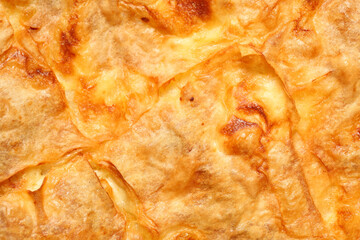 Top down view, extreme close up of delicious, homemade traditional Bulgarian breakfast called banitza.