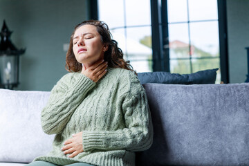 Young woman suffering from cold