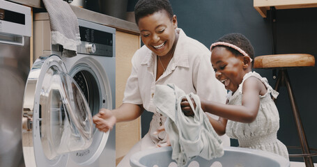 Laundry, mother and child helping with folding of clothes together in a house. Happy, excited and...