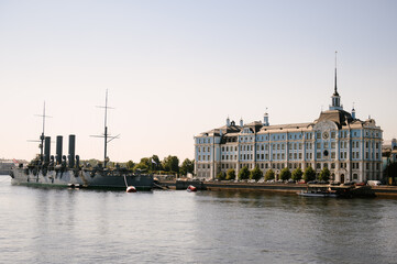 Fototapeta premium The legendary Russian warship cruiser Aurora is approaching the Neva River. Saint Petersburg, Russia. March, 2023.