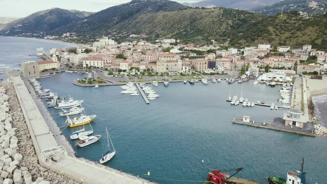 Aerial view of boats docked in the harbour, Acciaroli, Salerno, Campania, Italy.