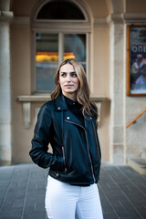 Fototapeta premium Woman wearing casual clothes walking on the street