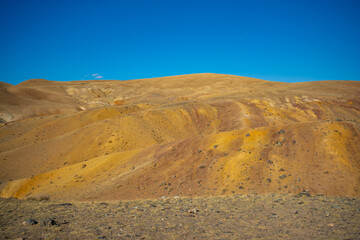 Yellow mountains in Kyzyl-Chin valley or Mars valley in Altai, Siberia, Russia.