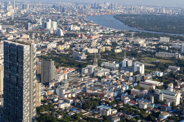 Daytime view of the big city and the green garden in the big city.