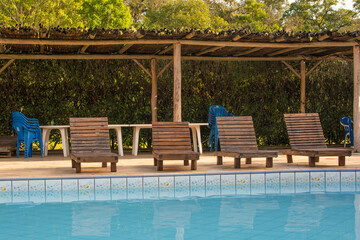 Sun bed near the pool in the resort, Brazil