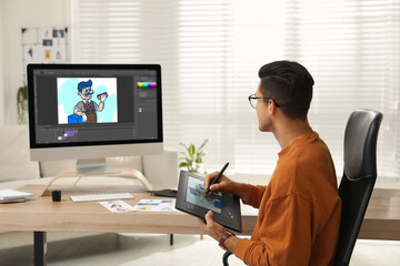 Animator using graphic tablet and computer. Illustration on screens - obrazy, fototapety, plakaty