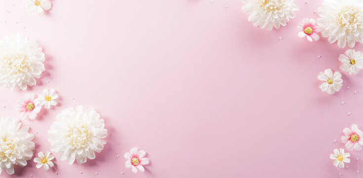 Happy Women's Day decoration concept made from flower on pink pastel background.