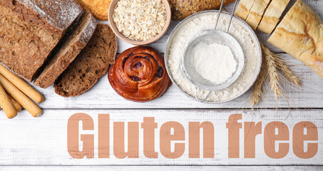 Different baked gluten free products and text on white wooden table, top view