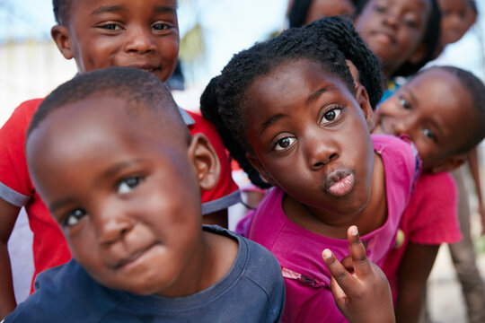 Young And Full Of Life. Shot Of Kids At A Community Outreach Event.