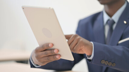 Close up of African Male Hand Using Digital Tablet