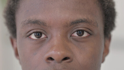 Close Up of Blinking African Male Eyes
