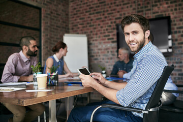 Ive got technology on my side. Cropped shot of a business meeting in the boardroom.