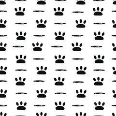 Fototapeta na wymiar Animal paw seamless pattern in black color on a white background.
