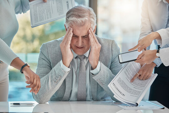 Chaos, stress and senior businessman with headache from multitasking, workload and team pressure in office. Crisis, fail and corporate manager with anxiety, mistake and compliance, documents or audit