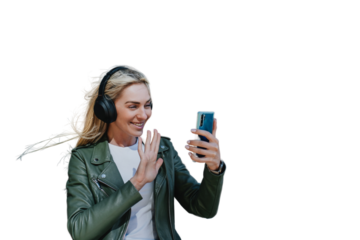 Young hipster Italian girl making talking via internet saying hello against transparent background. Beautiful young woman walking, making video call, swedish student, vacations, traveling having fun