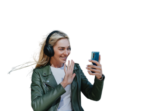 Young hipster Italian girl making talking via internet saying hello against transparent background. Beautiful young woman walking, making video call, swedish student,  vacations, traveling having fun