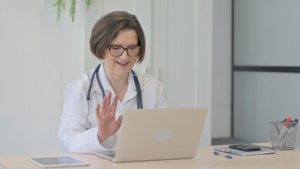 Old Female Doctor Doing Online Video Chat