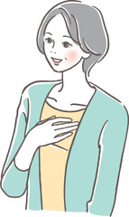 胸に手を当てるシニア女性