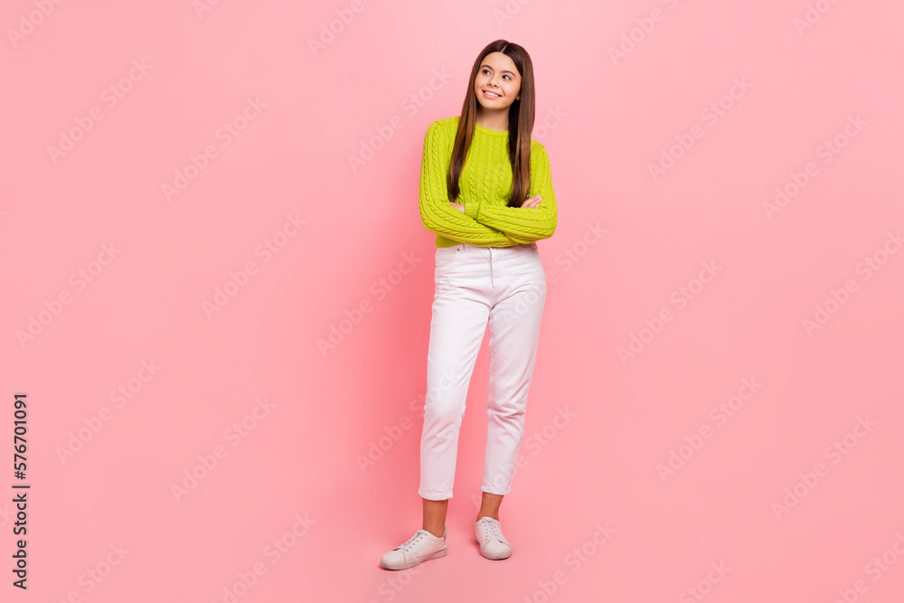 Poster full size photo of lovely teen lady crossed arms look empty space shopping wear trendy green garment