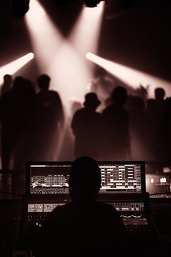 DJ - Nightclub in Paris - Mixing Music at a Party