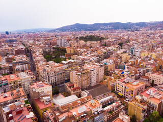 Obraz premium mass of roofs of houses on the spanish city of Barcelona