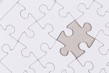 Fototapeta premium white puzzle jigsaw close up