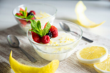 Lemon mousse with red berries. 