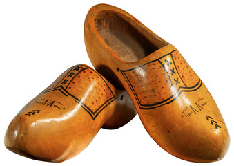 Close-up of a pair of wooden clogs made in Netherlands, isolated on white or transparent...