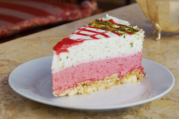 Raspberry mousse cake with a sponge base.