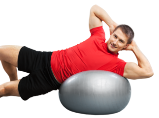 Young man doing fitness exercise on pilates ball