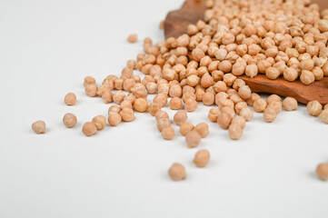 Organic chickpeas on a wooden stand. Side view