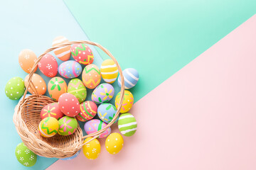 Easter Day celebrate time with easter eggs on pastel background for top view