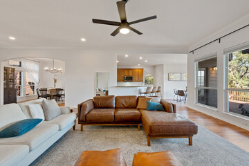 clean living room with leather couches 