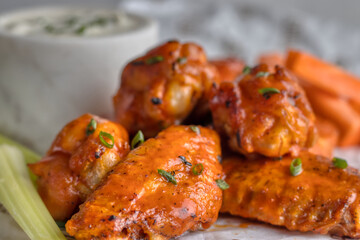 delicious chicken wings in spicy buffalo bbq sauce