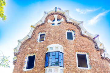 The Famous Summer Park Guell over bright blue sky in Barcelona, Spain. 