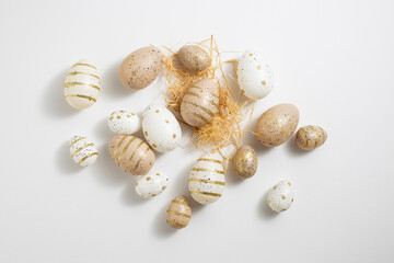 Beautiful Easter eggs on a white background. View from above