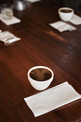 Barista preparing to test and inspecting the quality of coffee