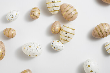 Beautiful Easter eggs on a white background. View from above