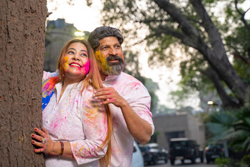 Fototapeta premium Indian people celebrate holi festival together at park.