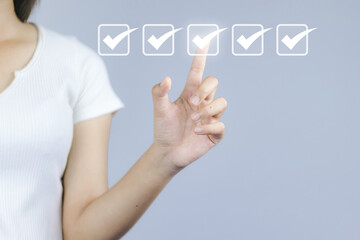 Checklist Survey concept woman's hand Correct mark checklist corresponding to the issue and clearly...