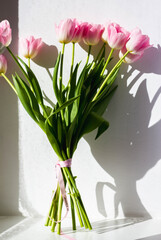Bouquet of pink tulips, top view, spring bouquet.