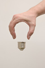Man Hand Shaped like A Light Bulb