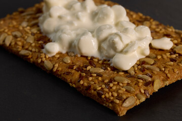 crunchy eco snack made from whole wheat flour and three types of seeds with cottage cheese.