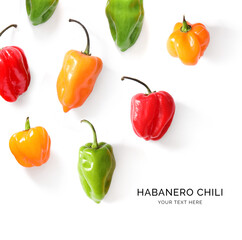 Creative layout made of habanero pepper on the white background. Flat lay. Food concept. Macro  concept. 
