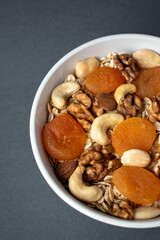 breakfast, oatmeal with apricots and nuts, dried fruit