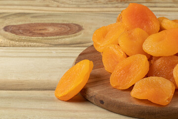 Portion of apricot on cutting board. Copy space.