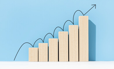 Growth, increasing business, success process concept. Increasing bar graph with arrow going up on...