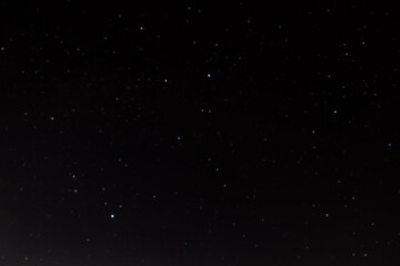 Summer triangle (Deneb, Vega, Altair) with line in dark night sky. Stellar summer triangle consisting of the brightest stars of constellations Swan, Lyra and Eagle: Deneb, Vega and Altair.