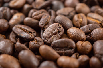 Fototapeta premium Fresh roasted brown coffee beans background